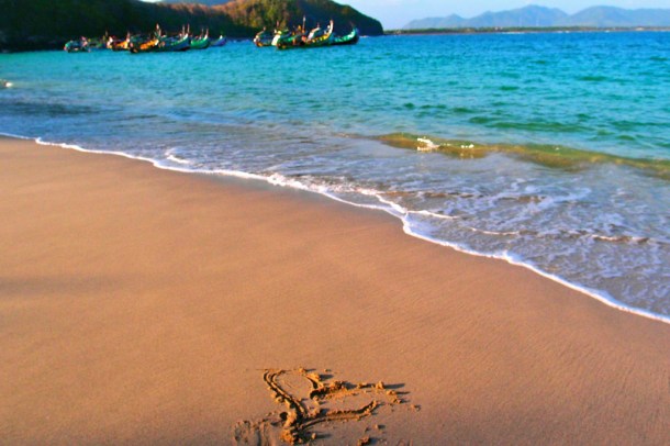 I can come up with a few cheesy metaphors association love with a drawing in the sand, but I'll let you make your own. (Also, I'm recycling this photo because it's my blog and I want to.)